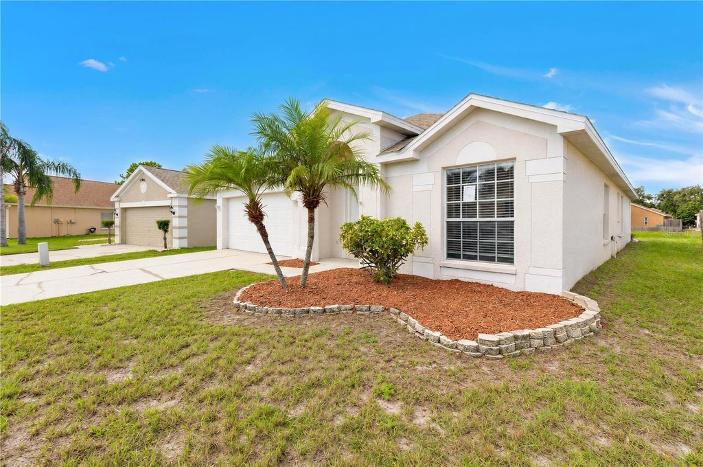 Photo of 12517 Midpointe Drive, Riverview, FL 33578 (MLS # O6450338)