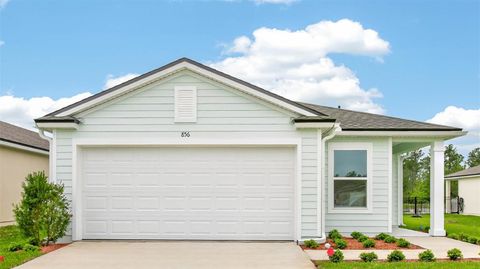 Photo of 856 Grand Reserve Drive, Bunnell, FL 32110 (MLS # FC315072)