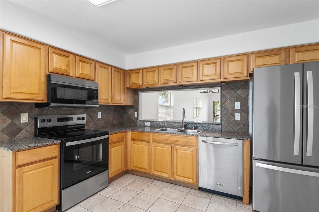 Photo of 7352 Tower Bridge Drive, Wesley Chapel, FL 33545 (MLS # O6329207)