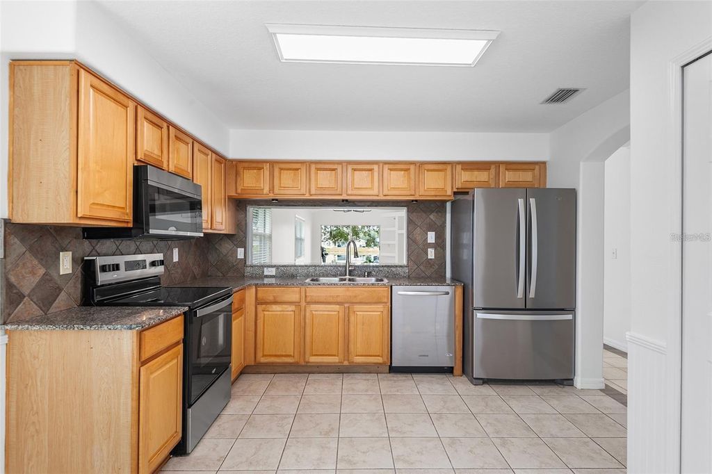 Photo of 7352 Tower Bridge Drive, Wesley Chapel, FL 33545 (MLS # O6329207)