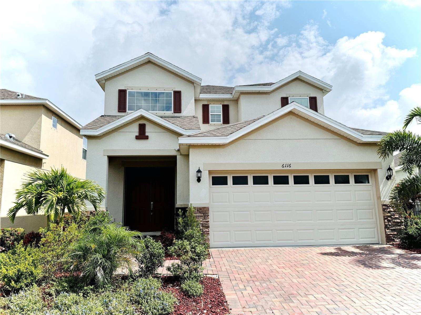 Experience resort-style living at its finest in this stunning 2303 sq. ft., 4BR/3BA/2 Car Garage home nestled within the sought-after WATERSET COMMUNITY of Apollo Beach! Boasting a spacious open floor plan, the heart of the home is a chef's dream kitchen featuring a sizable breakfast bar, quartz countertops, 42” wood cabinets, stainless steel appliances, and a gas range. Overlooking the inviting dining and family living area, the kitchen seamlessly flows to a rear porch offering picturesque views of the lush green backyard. With sliding doors and ample windows, natural light floods the interior, accentuating the tile flooring in the main living areas and plush carpeting in the bedrooms. The expansive master suite is a haven of luxury, boasting a generously sized in-suite bath complete with walk-in closets, a double granite vanity, separate shower, and a luxurious garden tub. Plus, one of the three guest bedrooms is conveniently located on the first floor. Monthly lease includes lawn care/fertilization and pest control. The WATERSET COMMUNITY sets itself apart with an array of amenities, including three community pools, splash pads, water slides, a fitness center, tennis/basketball/pickleball courts, sand volleyball, biking and walking trails with outdoor fitness stations, and The Landing Café for casual dining. Enjoy outdoor concerts and an abundance of family-friendly entertainment options. The community also offers convenient access to Daycare at Waterset and SouthShore Montessori at Waterset, as well as nearby public, magnet, and charter schools. Conveniently located near fine dining, beaches, hospitals, supermarkets, and major highways including US-301, US-41, and I-75, Waterset offers an easy commute to MacDill AFB, downtown Tampa, and charming Sarasota. Schedule your appointment today to discover the endless possibilities of this exceptional home! You won't be disappointed!