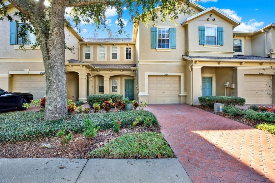 This beautifully maintained 2-bedroom townhome offers LOW MAINTENANCE living in a prime Land O’ Lakes location, just minutes from the Veterans Expressway and The Hub at Bexley. Built by M/I Homes in 2005 and lovingly cared for by the original owners, the interior has been fully repainted and upgraded with brand-new LVP flooring downstairs, plus new appliances with extended warranties. Major systems have been thoughtfully updated, including an HVAC replacement 5 years ago with a U/V bulb added for enhanced indoor air quality. The exterior was repainted 3 years ago and the roof replaced 2 years ago—both covered by the HOA for added peace of mind. A transferable Choice Home Warranty provides extra protection, making this home truly move-in ready and worry-free.