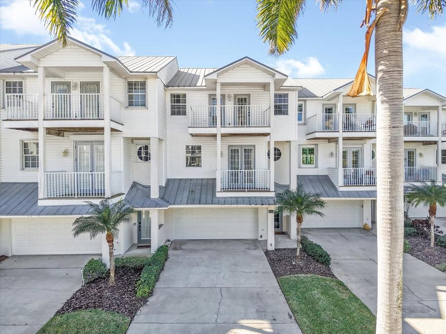 Turn-Key Coastal Living Just Steps from the Beach – Furnished & Move-In Ready!

Life is simply better by the beach! Just a couple-minute walk to the sand, this beautifully updated, furnished townhome offers the ultimate in effortless coastal living. Built with durable concrete block construction and designed as an elevated townhome, this residence also features 3 bedrooms, 2.5 baths, a rare 3-car garage, private elevator, multiple balconies, and partial Gulf views—every detail thoughtfully designed for comfort, convenience, and enjoying the Florida lifestyle from day one.

From the moment you arrive, swaying palm trees and the charm of this boutique community set a relaxed, beachside tone. And the best part? The Gulf is practically at your doorstep—perfect for morning walks, sunset views, and spontaneous beach days anytime you please.

Inside, the home unfolds across multiple levels, all easily connected by your private elevator—adding both ease and flexibility to everyday living. The first floor welcomes you with a private patio, a peaceful space to unwind after a day in the sun or enjoy a quiet evening breeze.

Upstairs, the main living level is bright, open, and inviting. The spacious living room flows seamlessly to a private balcony, extending your living space outdoors and creating that easy, breezy indoor-outdoor lifestyle. The dining area is perfectly positioned for gathering with friends and family, whether it’s a casual dinner or a special occasion.

The kitchen, remodeled in 2021, is both stylish and functional—featuring stainless steel appliances, a large center island with bar seating, wine fridge, drawer microwave, and abundant storage. A built-in nook offers the perfect spot for a desk or planning space, while an additional balcony just off the kitchen is ideal for morning coffee or evening cocktails with a coastal backdrop.

The primary suite is your private retreat—spacious and thoughtfully designed with a stylish accent wall and its own balcony showcasing partial Gulf views and unforgettable sunsets. The en-suite bath has been beautifully updated with dual sinks and a large walk-in shower, along with a generous walk-in closet.

Secondary bedrooms are equally well-sized and share access to another balcony, allowing natural light and fresh air to flow throughout the home.

Additional highlights include approximately $25,000 in hurricane-rated windows for added peace of mind, and the highly sought-after 3-car garage, offering plenty of space for vehicles, storage, bikes, and all your beach gear.

Step outside your front door and enjoy the community’s heated pool and hot tub, tucked into a serene courtyard—perfect for relaxing after a day on the water.

And the location? Truly unbeatable. Positioned between the Gulf and the Intracoastal, you’re surrounded by everything that makes beach living so special—local parks, tennis and pickleball courts, waterfront dining, and charming shops all nearby. Plus, easy access to St. Petersburg, Tampa, Tampa International Airport, and St. Pete–Clearwater International Airport makes travel a breeze.

Set on a barrier island where others vacation, this home offers something truly special—a fully furnished, turn-key opportunity to step right into the beach lifestyle you’ve been dreaming of.

Welcome home to North Redington Beach living at its finest!