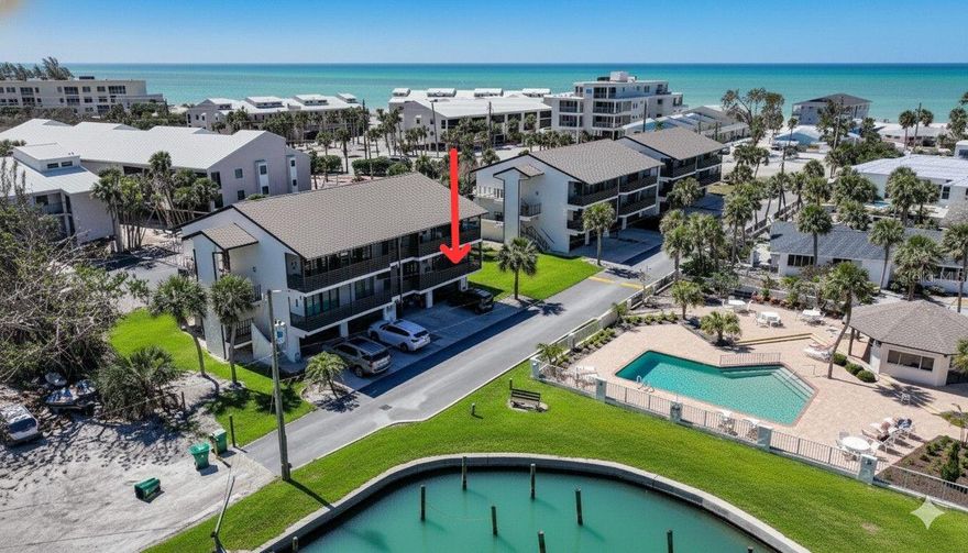 Welcome to Fantasy Island, a highly desirable waterfront condominium community on the beautiful shores of Manasota Key. This well-kept 2-bedroom, 2-bathroom condo offers the perfect blend of relaxation, comfort, and coastal charm, complete with stunning views of Lemon Bay and private deeded beach access to Englewood Beach. Whether you're looking for a year-round residence, a seasonal getaway, or an income-producing investment, this home checks all the boxes.

Inside, the condo features a bright and inviting open floor plan with a split-bedroom layout that provides excellent privacy for both owners and guests. Tile flooring spans the main living areas for easy maintenance, while soft carpeting in the bedrooms adds extra comfort. Large hurricane glass sliding doors extend your living space to the screened lanai, where peaceful water views create the perfect backdrop for morning coffee or evening unwinding.

The kitchen is designed for convenience and functionality, offering ample cabinetry, modern appliances, and a useful breakfast bar ideal for casual dining or entertaining. The primary suite includes its own private bathroom, while the guest bedroom and bath are thoughtfully positioned to give visitors a comfortable and quiet retreat.

A rare bonus to this unit is the spacious 2-car tandem garage, providing plenty private and secure storage for vehicles, kayaks, bikes, and all your beach and boating gear. There’s even additional space for a workshop or extra storage, adding flexibility that is hard to find in coastal condo living.

Situated in a serene tropical setting, Fantasy Island offers exceptional amenities including a bayfront pool, boat slips, and immediate access to the sandy shores of the Gulf of Mexico. From boating and fishing to beach days and breathtaking sunsets, this is coastal living at its finest on Manasota Key. Don’t miss your chance to own your piece of paradise—schedule your showing today!