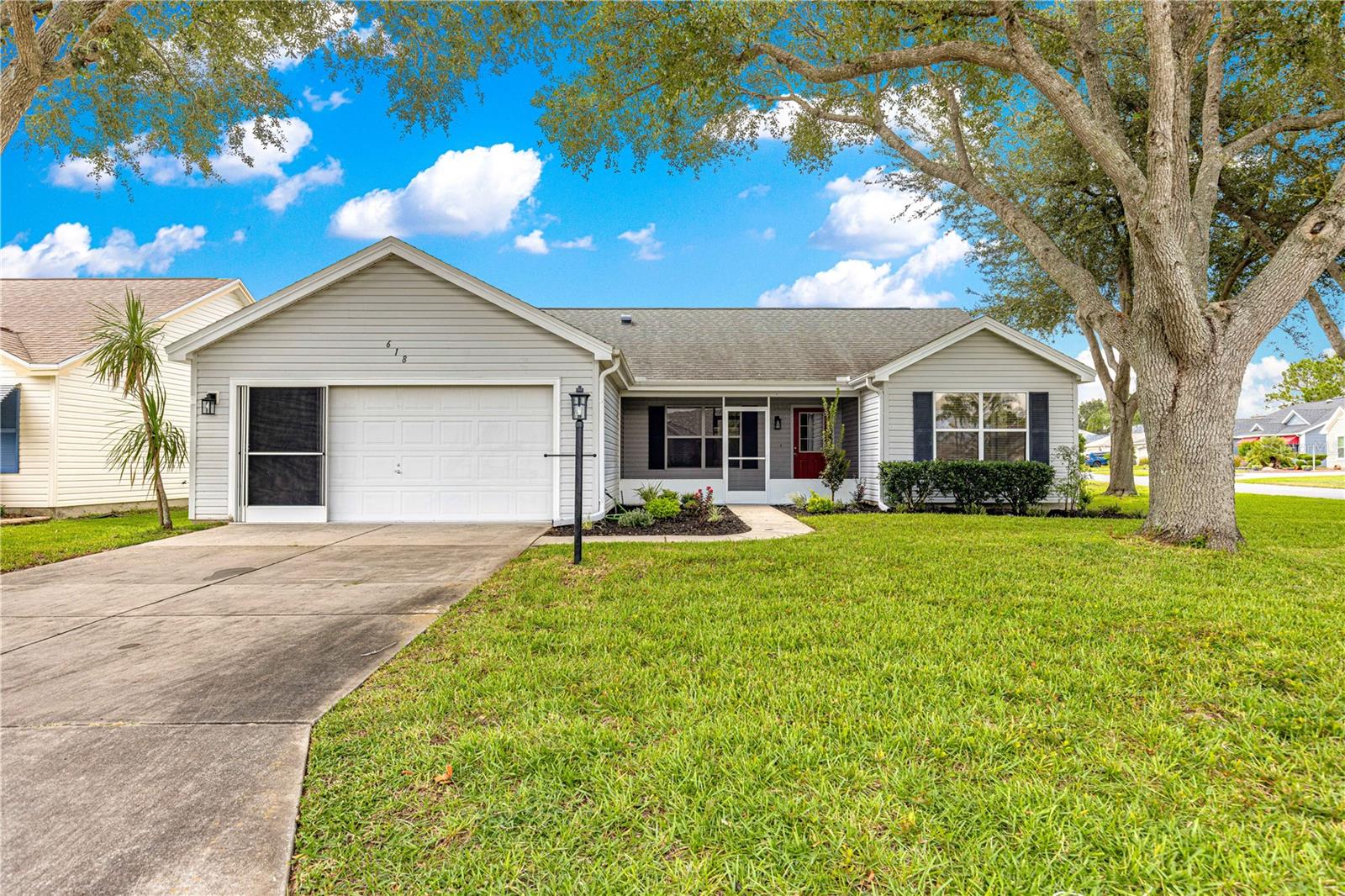 Welcome to Your Next Dream Home in The Villages® MOVE IN READY !** BOND PAID**NEW QUARTZ TOPS**ALL NEW APPLIANCES**2020 ROOF**CORNER HOMESITE**NEW LVP FLOORING**CUSTOM PAINT**
Located in one of the most highly sought-after and convenient areas of this world-famous community, this home offers the perfect blend of comfort, style, and functionality. Previously known as the Catalina III and now more famously referred to as the Bougainvillea, this beloved Designer floor plan is sure to put a smile on your face the moment you step inside.
The thoughtful split floor plan ensures privacy for you and your guests with the owner’s suite on one side of the home and the guest bedrooms on the other. This home has been completely updated from top to bottom, giving you peace of mind and a truly move-in-ready experience. You will be welcomed by fresh custom interior paint and new luxury vinyl flooring throughout, with no carpet anywhere. The brand-new cabinetry features real wood, soft-close doors, and dovetailed drawers, while all-new stainless steel smart appliances, including a brand-new wine refrigerator, provide both style and convenience. New Hunter ceiling fans have been added for comfort, and designer touches throughout include a frameless glass shower door in the owner’s suite with a stain-free coating, a WiFi-enabled ceiling fan, LED lighting for reduced energy costs, a built-in outlet in the owner’s suite drawer to keep your hair dryer tucked away, and an E-Z charger outlet for your devices.
Besides all of these major updates, you’ll love that this home is perfectly situated on a peaceful street on a corner homesite with beautiful shade trees. The bond is 100% paid off, and the location in Sumter County provides one of the most agreeable tax rates in the area. The water heater was replaced in April of 2021, and the entire HVAC system was replaced in 2019. Recently, the HVAC system was fully serviced, including a duct cleaning, and a UV light was added to enhance indoor air quality. . The BRAND NEW cabinetry features real wood, soft-close doors, and dovetailed drawers, while all-new stainless steel smart appliances, including a brand-new wine CHILLER, provide both style and convenience.
Additional features include a full two-car garage, an enclosed lanai with a new tile floor, and a spacious backyard offering plenty of room for a patio, outdoor kitchen, or even a tranquil water feature—what will you create? Come see for yourself why life in The Villages® is like no other.
BUYERS AGENT TO VERIFY ALL INFORMATION FOR BUYERS
BOND BALANCE $0.00 - YEARLY MAINTENANCE $453.62 -