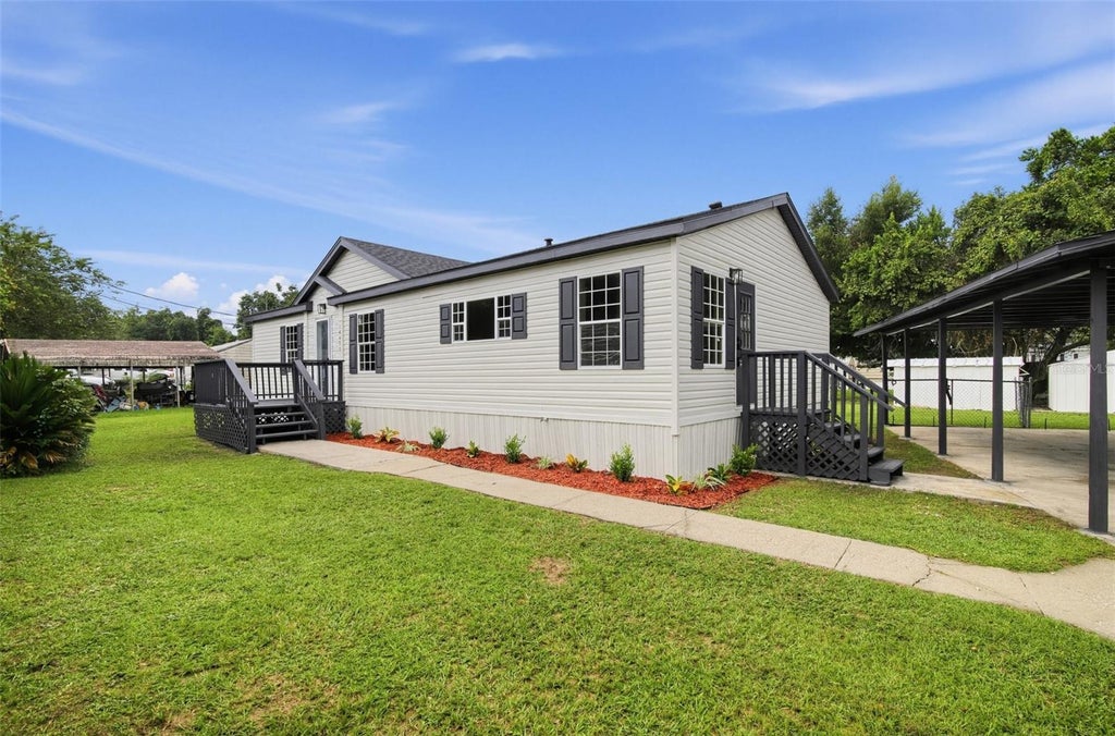 Photo of 14470 SE 91st Terrace, Summerfield, FL 34491 (MLS # O6441774)