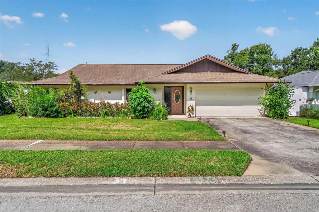 Photo of 5674 Bay Pines Lakes Boulevard, St Petersburg, FL 33708 (MLS # TB8540190)