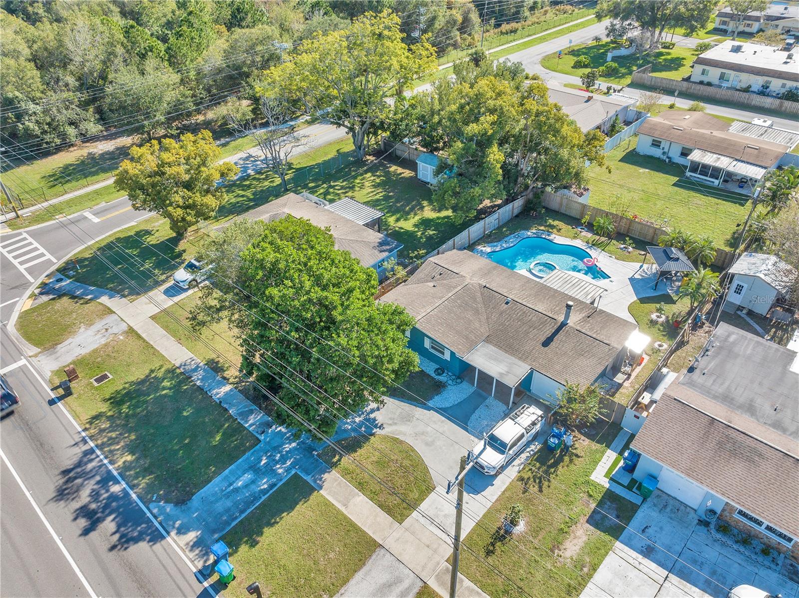 NO HURRICANE OR FLOOD DAMAGE FROM HELENE OR MILTON! **2024 annual Income VRBO and AIRBNB $54,085 YTD || 2023 annual Income $54,080 collectively. The owner also blocks out one month of dates for their own leisure annually, So there is potential to increase more income for the future. Come see this Fully Furnished AIRBNB Pool home in Clearwater, FL just a few miles from Clearwater Beach, America's voted "Best Beach" on TripAdvisor! This 2 bedroom, 2 Bath concrete-block heated POOL home has been fully updated and is being sold fully furnished! Fully updated with new tile flooring, Stone flooring in bathrooms, double pane windows, interior and exterior painting, cabana, and more! Entering through the door, you are greeted with an open floorplan with recessed lighting, new tile flooring throughout, stainless steel kitchen appliances, french doors, and fireplace all in one area perfect for large gatherings and entertaining. Minisplit units are installed in every room for efficiency purposes and personal comfort for everyone. The primary bedroom is equipped with a large walk-in closet, and an ensuite bathroom with a fully updated separate shower and bathtub, stone flooring, with a costal charm! The guest bedroom is just down the hallway and is also equipped with a walk-in closet tile flooring, and is extra spacious! There is a laundry room in the garage and the washer and dryer are included in the sale. Leading out the rear french doors a covered screen porch awaits overlooking a beautiful backyard with a sparkling blue inground heated pool and spa with a finished pool deck, outdoor metal cabana area, palm trees, and shed area. Roof installed in 2014, updated double pane windows, water heater, ductless minisplit units, 1-year-old pool/spa heater, new water heater installed 2023, and more! This is a well-priced truly turnkey home you MUST SEE IN PERSON, the pictures don't do it justice! NO HURRICANE OR FLOOD DAMAGE FROM HELENE OR MILTON!