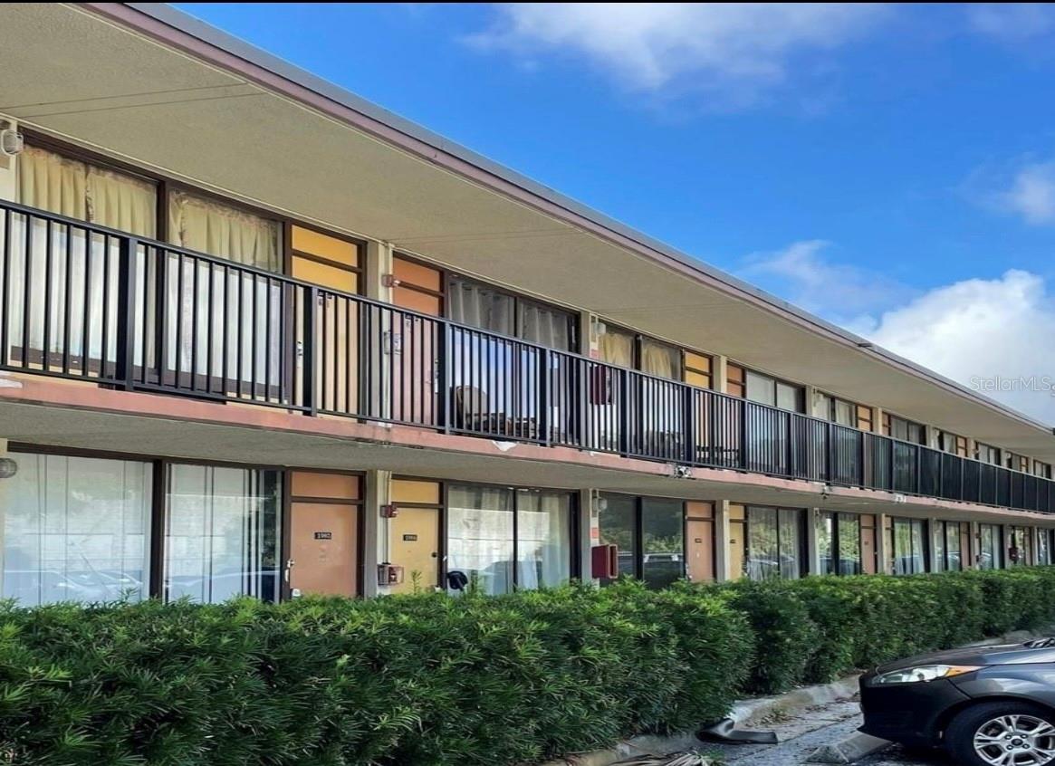 Discover this inviting studio apartment located at the desirable Sandlake Courtyards! This unit offers an exceptional value in a sought-after area. This cozy space features a well-designed layout with hardwood floors and central air for your comfort. The complex provides on-site amenities, including a refreshing community pool and a shared laundry facility. Conveniently located just minutes from major attractions like The Florida Mall, International Drive, and Universal Studios. Enjoy easy access to dining, shopping, and entertainment. Water and air conditioning are included, simplifying your monthly budget. This unit is perfect for a future tenant seeking a low-maintenance, accessible home. Don't miss out on this opportunity schedule a viewing today!