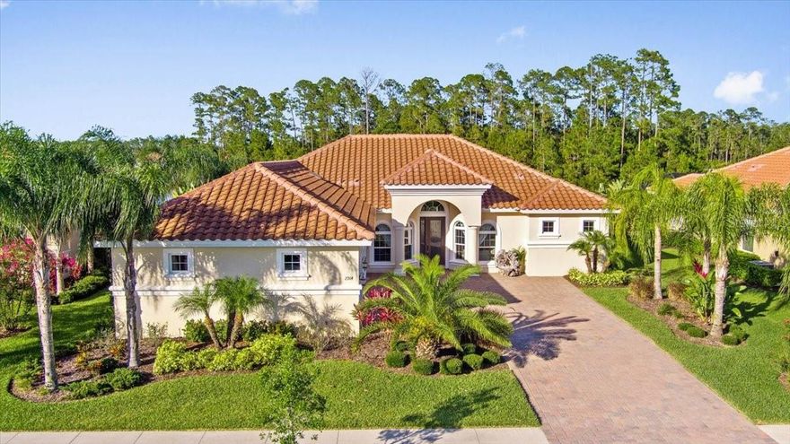 This Lovely 3 Bedroom, 3 Bath Pool Home with 3 Car Garage features Beautiful Finishes throughout & a Stunning Outdoor Space. The Open Floor Plan Great Room features a Spacious Kitchen, Separate Dining Room & Breakfast Nook, Flex Space to best suit your families needs and a Cozy Living Room to tie everything together along with a View of the Lakeside Preserve. The kitchen features sprawling counter tops with ample room for prep & entertaining, gorgeous wooden cabinets, stainless steel appliances & a well sized pantry. For complete privacy, the split bedroom plan has the master suite situated on one side of the home and the other two bedrooms & with their respective separate baths on the other. Outside is a true backyard paradise, with lagoon style feature salt water pool with solar heating, outdoor kitchen with bar, multiple spaces for entertaining situated around the pool & lakeside preserve views. The large laundry room & 3 Car Garage provide abundant space for storage & organizing. If you somehow run out of things to do in this beautiful home, it is located in Venetian Bay's Gated Portofino Reserve where there is something for everyone right in the neighborhood! An 18 Hole Championship Golf Course & Club, Resort Style Swim Club, Full Service Spa, On-site Gym, Miles of Trails to Walk or Bike & several wonderful restaurants like local favorite Bistro 424! All this plus the amenities of New Smyrna Beach; beautiful beaches, charming local businesses & an area geared toward an active yet relaxed lifestyle, make this the perfect place to call home! ;Water: City