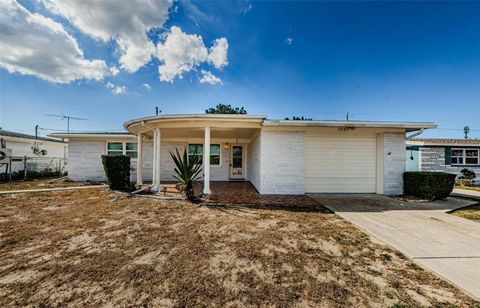 Photo of 1551 Derrick Street, Holiday, FL 34690 (MLS # TB8487566)