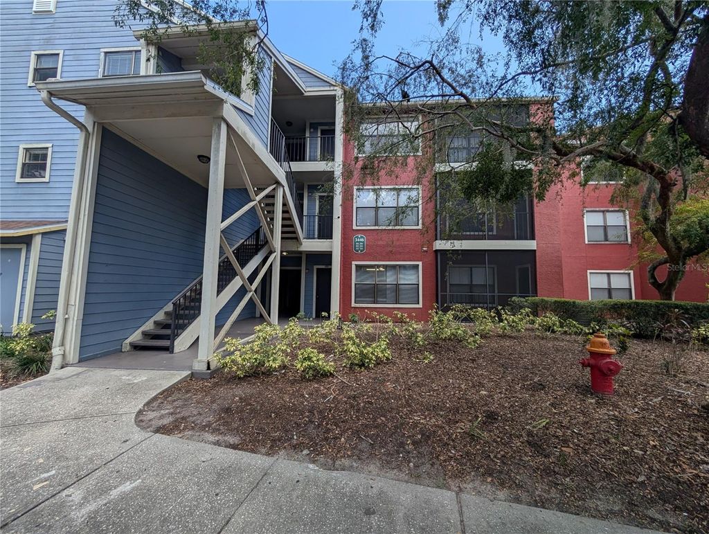 Photo of 3446 Saint Bart Lane #101, Tampa, FL 33614 (MLS # O6331435)