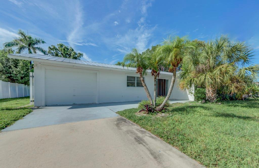 One or more photo(s) has been virtually staged. INVESTOR Special in Prime Sarasota Location!
Located on a quiet cul-de-sac in the heart of Sarasota, this 3-bedroom, 2-bath concrete block home is ready for your vision. The interior has been gutted, offering a blank canvas for a complete renovation or the opportunity to build new. A new metal roof (2022) adds immediate value and peace of mind.
The split-bedroom floor plan sits on an oversized, fenced lot with plenty of room to add a pool, making it ideal for future resale or rental potential. The neighborhood is rapidly transforming, surrounded by million-dollar new construction homes.
Families will appreciate the top-rated school district—Phillippi Shores Elementary, Brookside Middle, and Riverview High School. The location is unbeatable, just minutes to The Landings shopping center with its new Publix and phenomenal array of dining, plus Trader Joe’s right around the corner. World-famous Siesta Key Beach, downtown Sarasota, and all the area’s best amenities are a short drive away.
Don’t miss this opportunity to invest in one of Sarasota’s most desirable, centrally located neighborhoods.