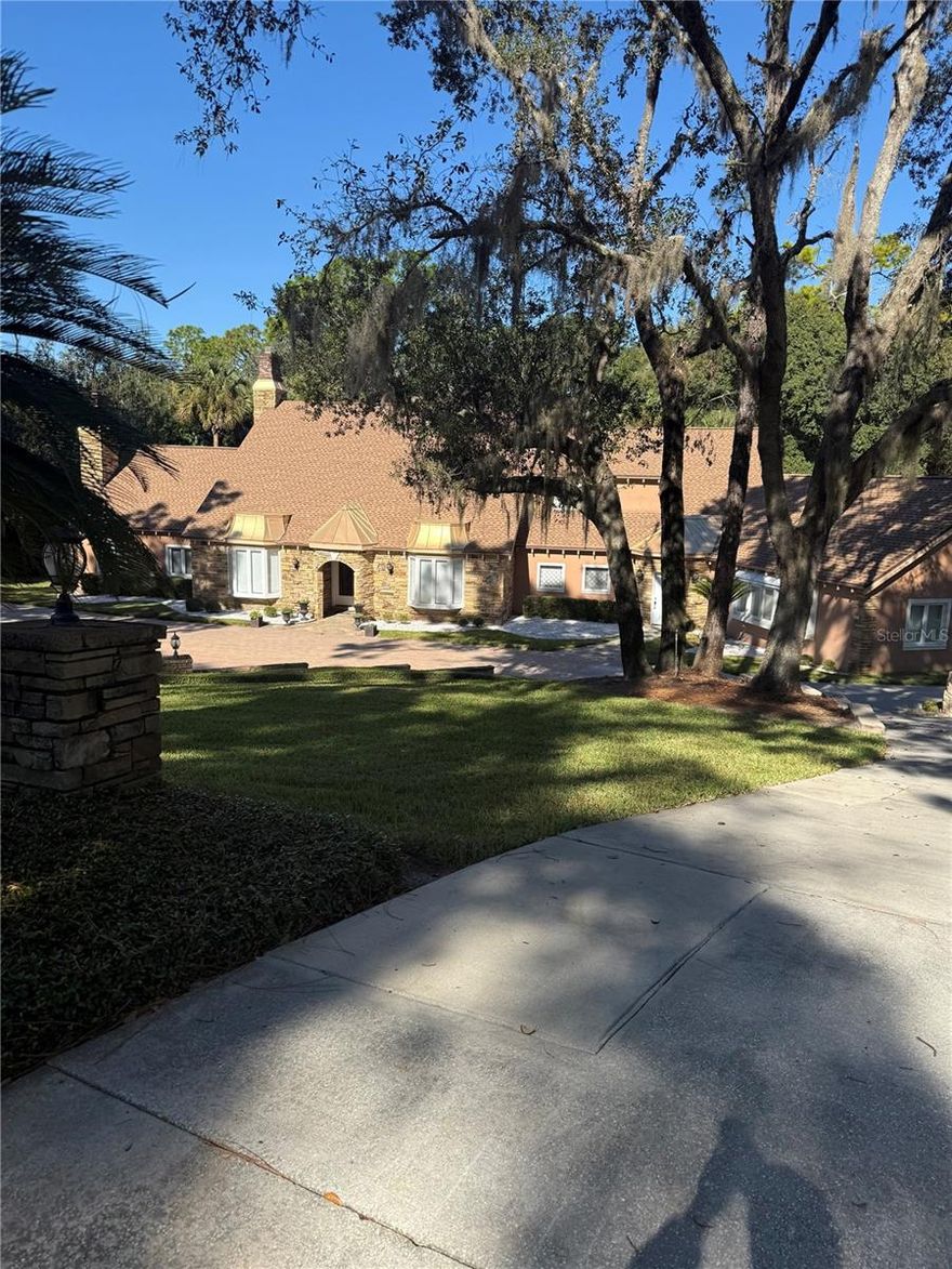 Almost a $1,000,000 of asking is an assumable loan at 4.75. Dream home with beautiful environment galore. Flowing open floor plan with high ceilings and crown molding throughout. Theater room, Florida room with indoors grill, 2 wood burning fireplaces, beautiful sought after community, gated with guards 24/7, wide large lots. Must see this picturesque environment filled with wealth and luxury. Priced to sell quickly, don't miss this once in a lifetime opportunity!