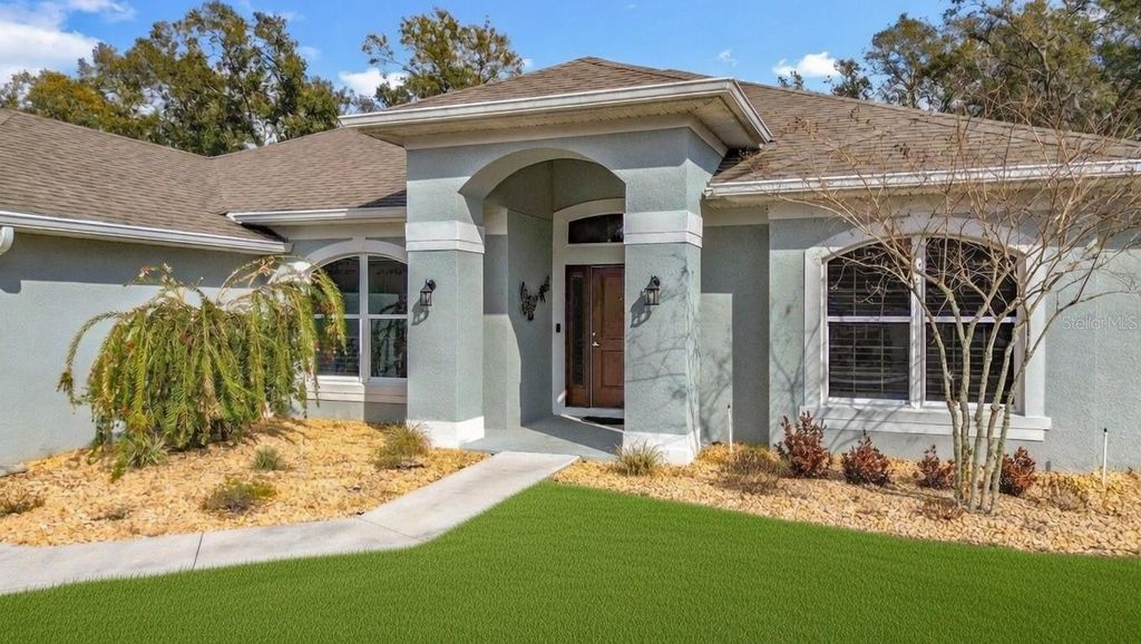 Photo of 904 Paso Alley, Fruitland Park, FL 34731 (MLS # OM718861)