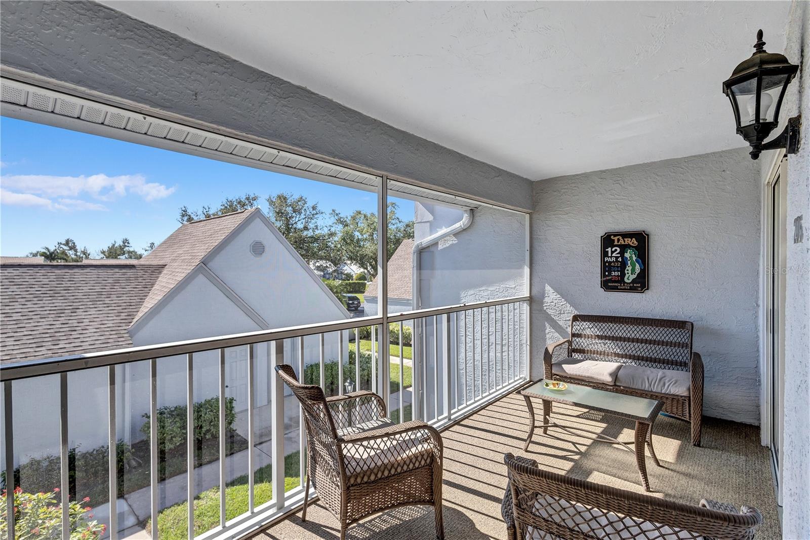 Live the Florida Country Club Lifestyle for Less!
Welcome to 6713 Stone River Rd 205, a meticulously maintained 2-bed, 2-bath, 1-car garage condo in The Verandas at Tara. This is your chance to own a piece of paradise with an unparalleled value proposition: a deeded golf membership to Tara Golf & Country Club, saving you thousands annually on championship golf and exclusive amenities!
Step inside this spacious and quiet 2nd-floor unit, offered partially furnished for your convenience. Enjoy breathtaking, million-dollar views of the fairway tees from your eat-in kitchen or the expansive, glass/screen-enclosed lanai. This versatile space can seamlessly expand your living area or become your private sunroom, offering serene treed golf course vistas. Vaulted ceilings and a spacious kitchen with solid wood cabinets create an open feel. An additional screen-enclosed front lanai provides another peaceful spot to savor the morning sun.
Beyond your doorstep, discover resort-style living. You're just steps away from the large heated community pool! The Tara Golf & Country Club boasts an 18-hole championship golf course (recently renovated with $1.5M!), a state-of-the-art exercise facility, hot tub, sauna, heated lap pool with a concession stand, Har-Tru tennis courts, bocce ball, and pickleball coming in 2025! The magnificent Tara Clubhouse offers fine dining, a grill room, a driving range, a putting green, a pro shop, and a very active social calendar featuring regular entertainment.
Recent updates include AC (2019), Water Heater (2019), and Roof (2018). The Total Area is 1,385 SqFt. Tara Reserves and The Verandas at Tara are financially sound associations.
Enjoy million-dollar picturesque views from your screened and glass-enclosed lanai (the first-floor units don't give you this view) and maintenance-free living in a secure, beautifully manicured community. With low HOA fees and no state income tax, this is the smart play for snowbirds & sunbirds, investors, or year-round golfers.
Priced below market and ready to move in — see it today before the snowbirds and sunbirds return.
Highlights:
• DEEDED GOLF MEMBERSHIP is a True Value!
• Washer/dryer in unit!
• Heated community pool, Har-Tru Tennis, Pickleball, Gourmet Clubhouse Dining, Bocce, Driving Range, Putting Green, Activities and Entertainment Daily, and much more.
• Just 20 minutes to beaches and SRQ Airport
• No CDD fees!
Motivated seller – bring your best! Golf where you live. Live where you golf! ... and you're one of the closest condos to the large heated community pool!
AC 2019. Water Heater 2019. Roof 2018. Tara Reserves are financially sound.
This condo is the best value in the Bradenton/Sarasota area. HOA provides water, sewer, and internet/Cable.
You can buy a home anywhere, but you can't buy a lifestyle. Come to Tara and live the Florida Country Club lifestyle at its best.