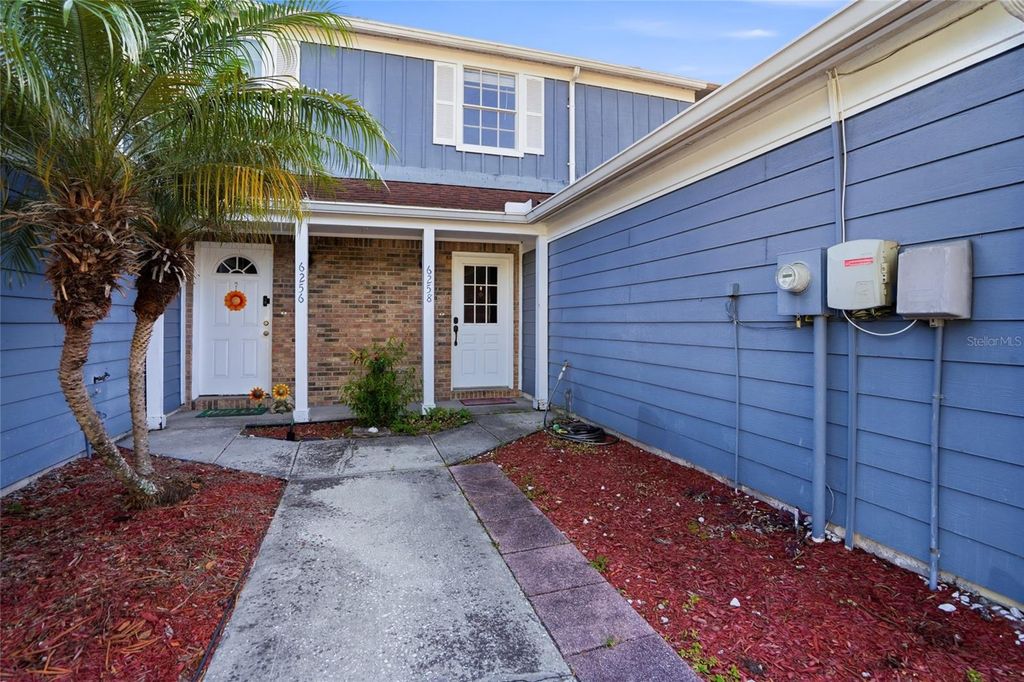 Photo of 6258 Oak Cluster Cir, Tampa, FL 33634 (MLS # TB8498633)
