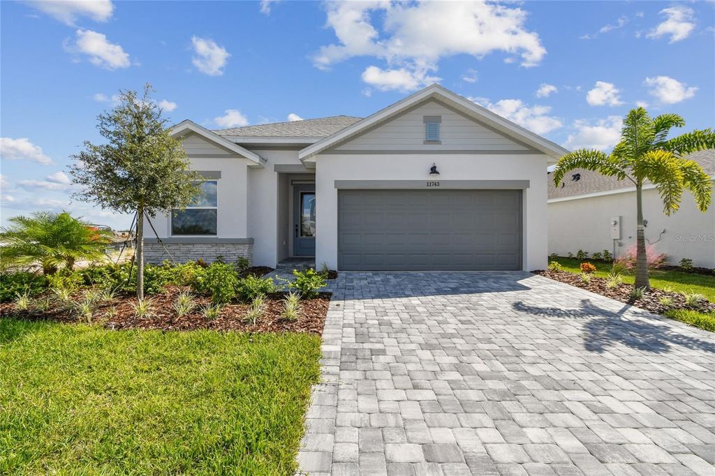 Photo of 11743 Full Moon Loop, Parrish, FL 34219 (MLS # TB8451895)