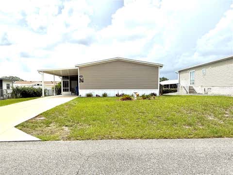 Photo of 9209 Fontaine Drive, Brooksville, FL 34613 (MLS # W7887470)