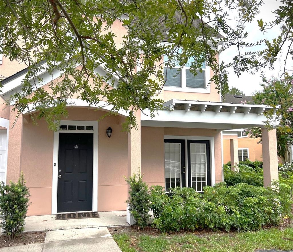 Photo of 3318 SW Greenwich Village Boulevard #203, Orlando, FL 32835 (MLS # O6398164)