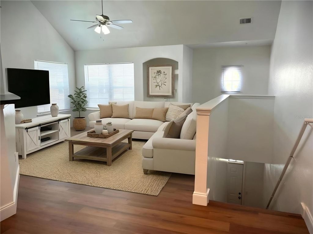 Photo of 3318 SW Greenwich Village Boulevard #203, Orlando, FL 32835 (MLS # O6398164)