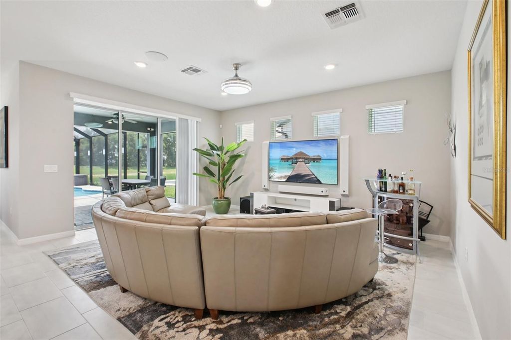 Photo of 9107 Rally Spring Loop, Wesley Chapel, FL 33545 (MLS # TB8397390)