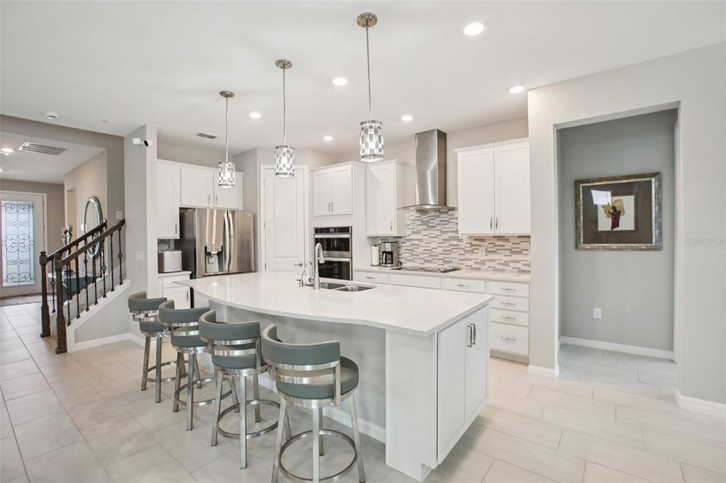 Photo of 9107 Rally Spring Loop, Wesley Chapel, FL 33545 (MLS # TB8397390)