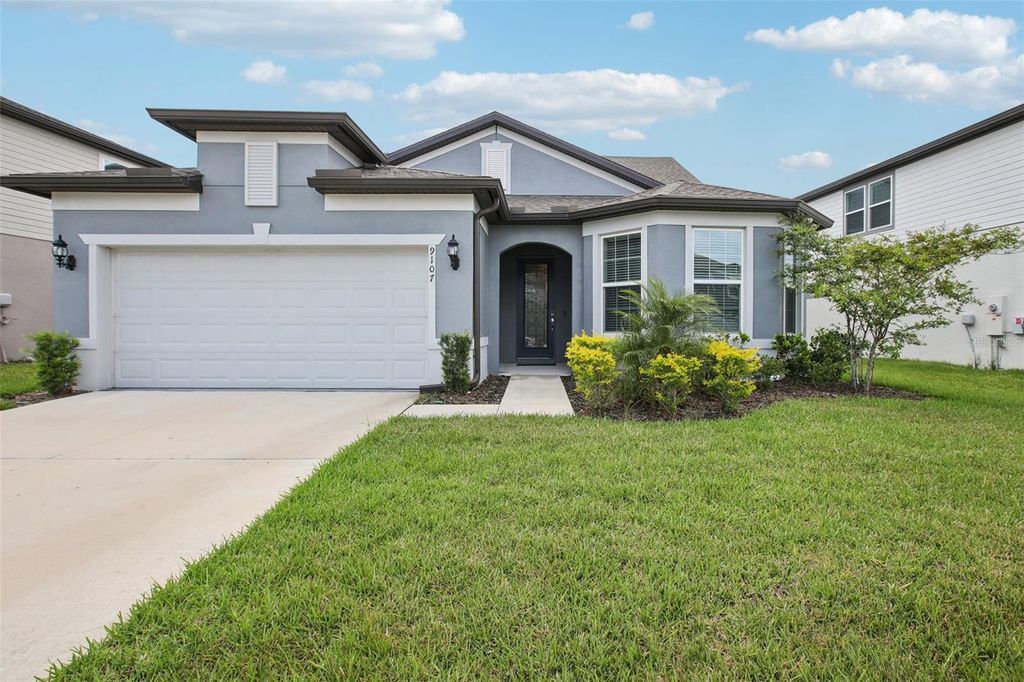 Photo of 9107 Rally Spring Loop, Wesley Chapel, FL 33545 (MLS # TB8397390)