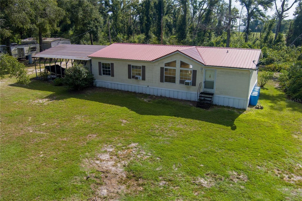 Photo of 22332 142nd Terrace, Live Oak, FL 32060 (MLS # TB8550928)