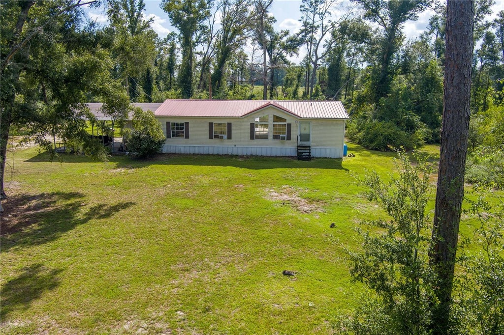 Photo of 22332 142nd Terrace, Live Oak, FL 32060 (MLS # TB8550928)