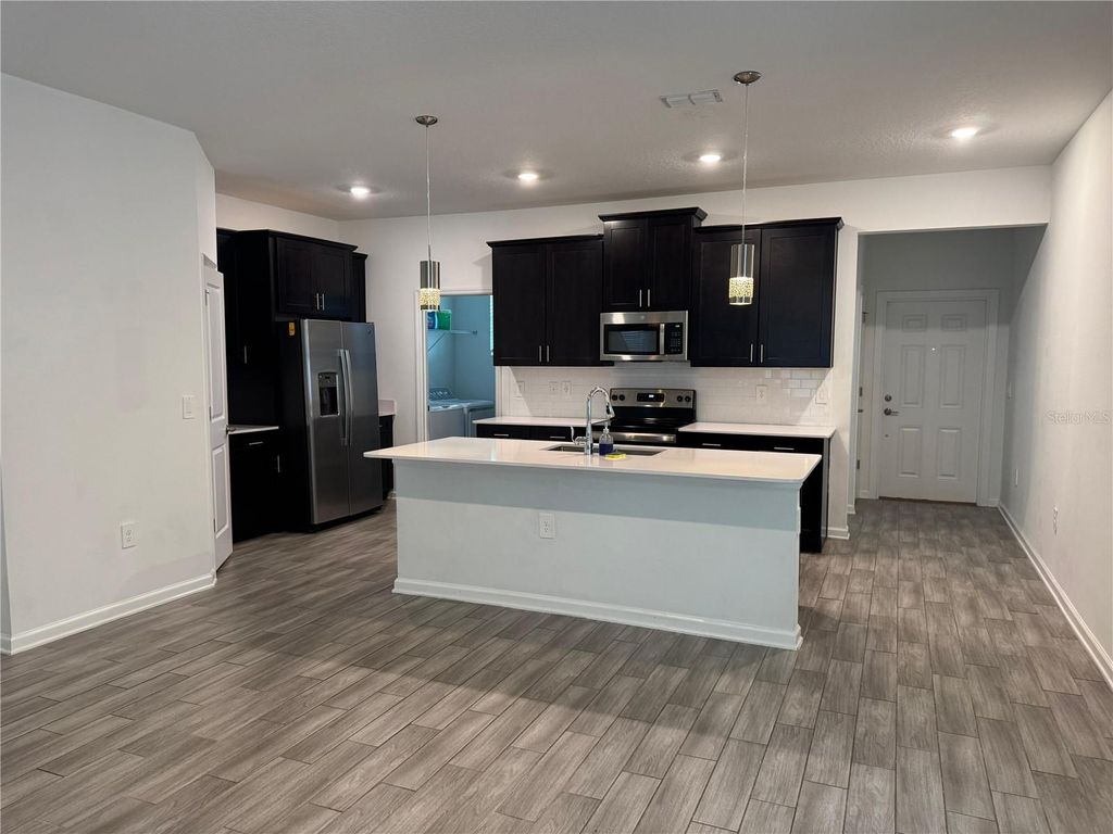 Photo of 1660 Cross Prairie Parkway, Kissimmee, FL 34744 (MLS # R4911009)