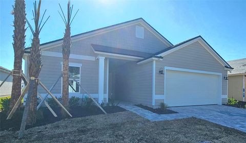 148 GREENWOOD DRIVE PALM COAST FL 32137