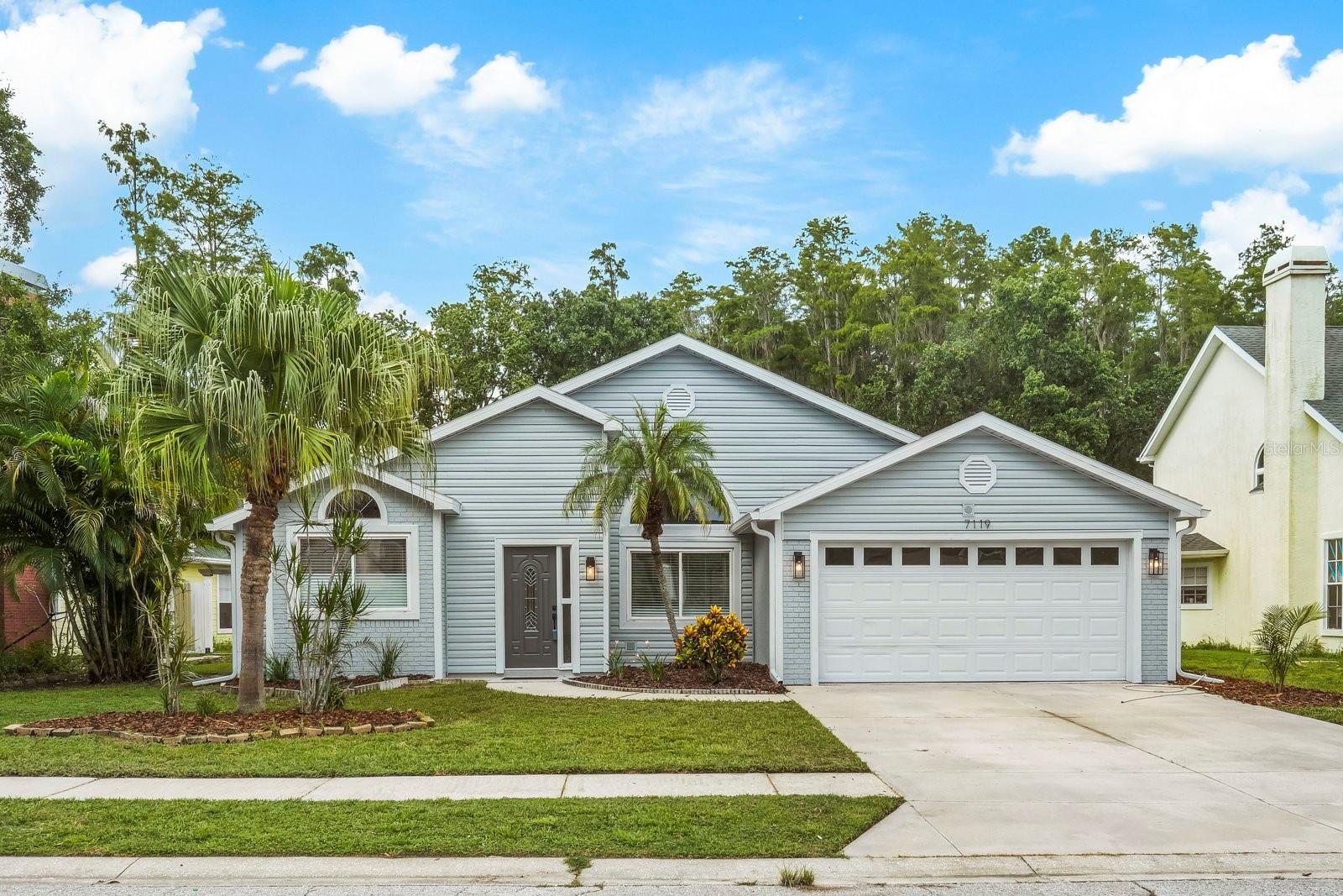Welcome to your new SANCTUARY in the heart of Trinity! This stunningly renovated 4-bedroom, 2-bath pool home offers over 1,800 square feet of thoughtfully designed living space in the highly desirable Nature’s Hideaway community—no flood zone, no CDD fees, and low HOA. Inside, you'll find a bright, open layout with brand-new luxury vinyl flooring throughout the main living areas and a show-stopping designer eat-in kitchen featuring sleek modern cabinetry, quartz countertops, and premium stainless steel appliances. The split-bedroom floor plan includes a serene master suite with sliding glass doors that open to the pool and lanai, plus a spa-inspired en-suite bathroom with dual sinks. Three additional bedrooms and a fully updated second bathroom provide ample space for family, guests, or a home office. Step outside to your private oasis with a screened-in pool and lanai, perfect for year-round relaxation and entertaining. With a newer roof and newer HVAC system, this home offers peace of mind and lasting value. Ideally located near top-rated schools, shopping, dining, parks, beaches, and the YMCA, and just a short drive to Tarpon Springs, Dunedin, Clearwater, and Tampa, this exceptional property delivers not just a home—but a lifestyle.