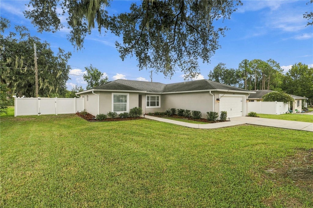 Photo of 1324 Auburn Street, Lakeland, FL 33801 (MLS # O6443977)