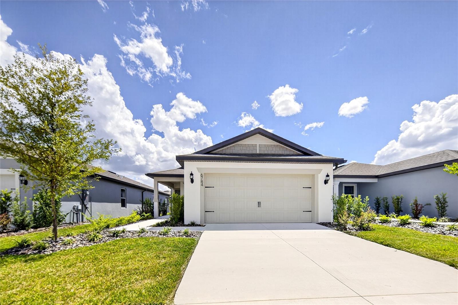 Never lived in rental in Pioneer Ranch this Daylen model by Pulte homes awaits you! This 4 bedroom and 2 bath, open floor plan is move in ready already complete with blinds,washer and dryer. Welcoming covered front entry leads to open floor plan featuring kitchen with large island overlooking dining and living room. Spacious primary bedroom leads to primary bat and walk in closet. The 3 additional bedrooms are off of kitchen and share the 2nd bath. Inside laundry room on this side of home as well. 2 car garage. Step outside through the double sliding glass door into your own screened in lanai overlooking the back yard.Internet and hoa included in monthly rent. Pets allowed call for details!