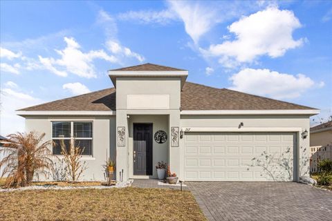 Photo of 267 Tarpon Bay Boulevard, Haines City, FL 33844 (MLS # O6384187)