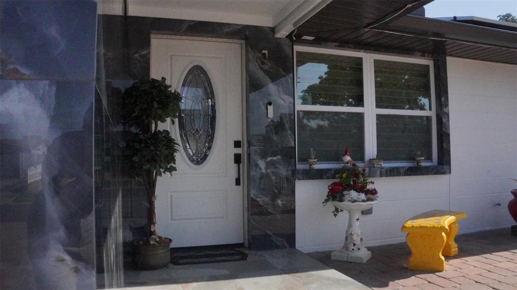 Photo of 4527 W Elm Street, Tampa, FL 33614 (MLS # TB8539794)