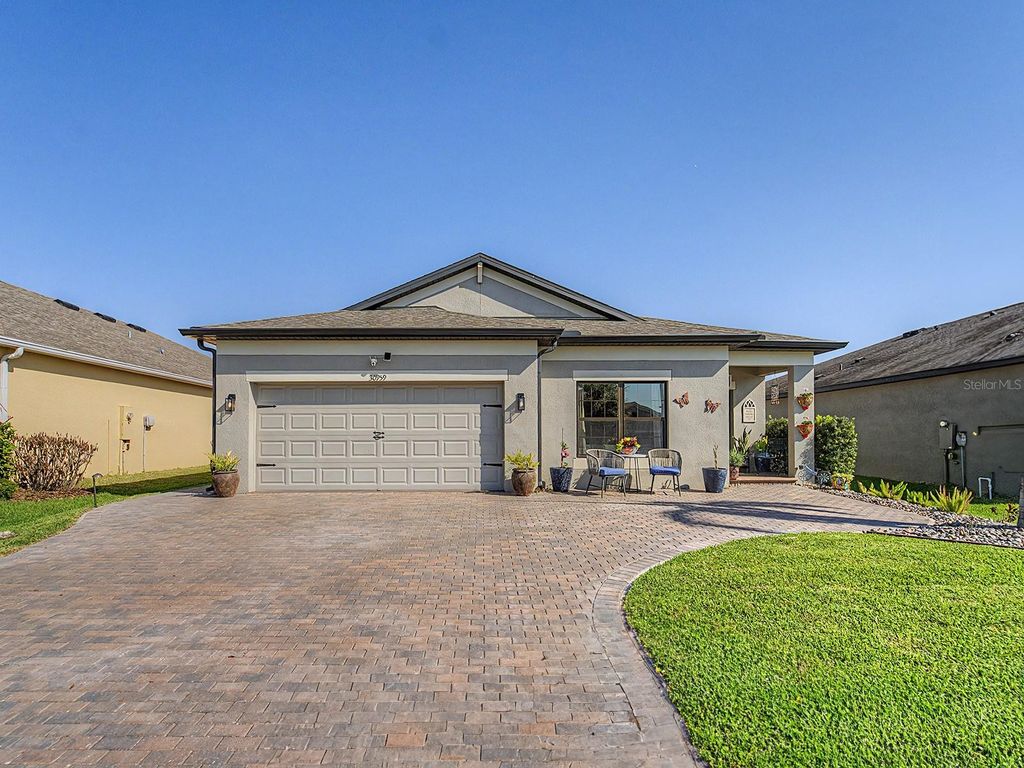 Photo of 30959 Parrot Reef Court, Wesley Chapel, FL 33545 (MLS # W7884437)
