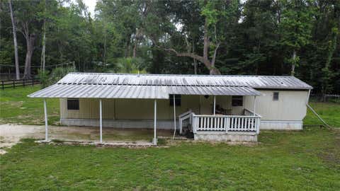 Photo of 16945 NW 128th Terrace, Reddick, FL 32686 (MLS # OM725902)