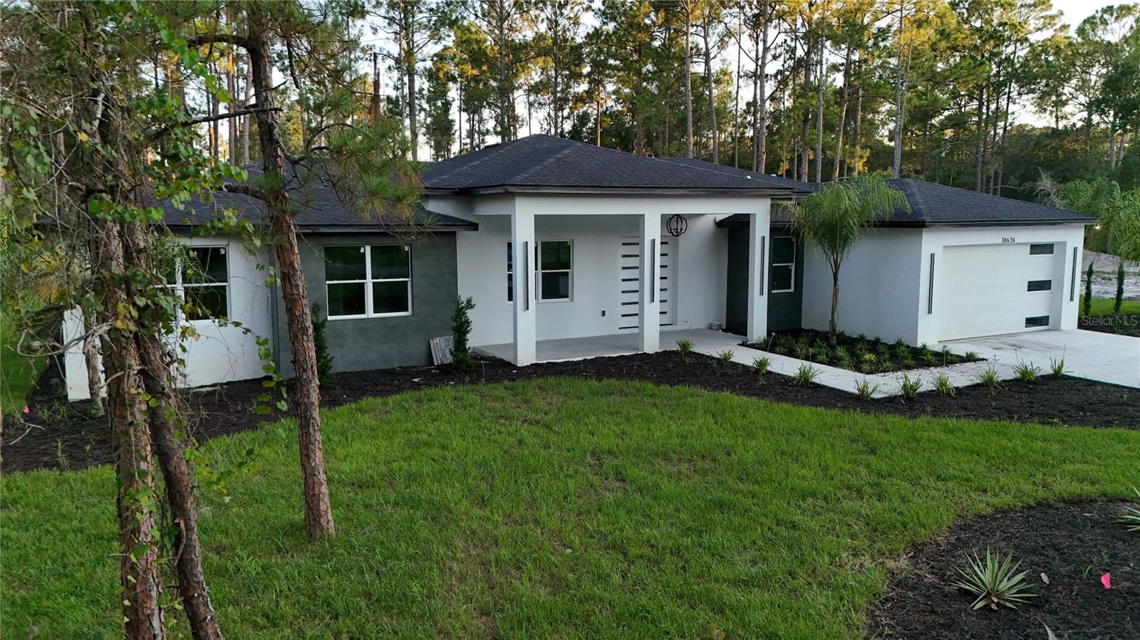 Under Construction. New Construction. Completion date is a week away. Luxury Home with impressive 14 foot ceilings, 4 Bedrooms, 2.5 Bathrooms. 1 acre lot. Master Bath includes separate tub and a walk in shower with 2 rainfall shower heads. Royal Trails community surrounded by Seminole State Forrest. Come live in the country with the deer and wild turkeys. Horses allowed. Community is only 12 minutes to Publix, and 13 minutes to Wekiva Parkway/SR429. Clubhouse/playground. Community boat ramp to private 1,200 acre Lake Norris. HOA fees only $95 a year. Paved, county maintained roads. No manufactured homes allowed.