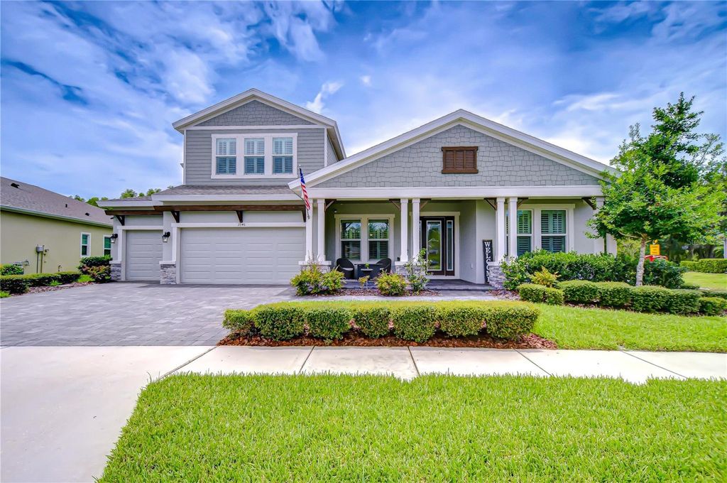 Photo of 3946 Woodland Retreat Boulevard, New Port Richey, FL 34655 (MLS # TB8410121)