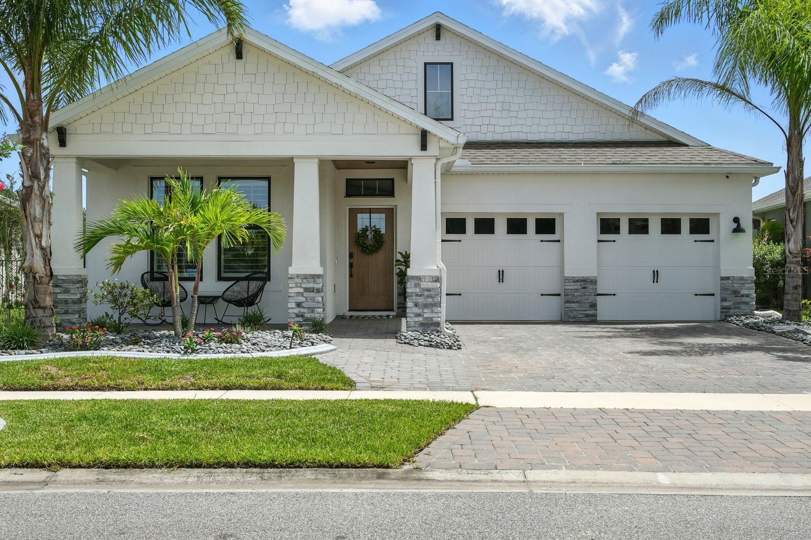 Stunning Pool Home with 4 Bedrooms, 3 Bathrooms, and lots of custom upgrades in Sought-After Venetian Bay!
Welcome to this beautifully crafted 4-bedroom, 3-bath home built in 2021, where modern design meets thoughtful functionality. Nestled on a unique pie-shaped lot in the highly desirable Venetian Bay community, this property offers both privacy and extra space—including a rare bonus: additional parking directly across the street.
Step inside and be greeted by elegant wood-look ceramic tile that flows seamlessly throughout the home, complemented by upgraded wainscoting and stylish finishes in every bathroom. The open-concept layout centers around a gourmet kitchen featuring sleek quartz countertops, 42 inch cabinets with ample storage. Closet's have been enhanced with built-in organizers, and the home includes a spacious laundry room, finished attic space, and a 2-car garage for ultimate convenience. All windows have remote shades or plantation shutters.
Out back, your personal oasis awaits. Enjoy tranquil pond views while relaxing in the saltwater pool and hot tub, or unwind under one of the two lanais finished with tongue-and-groove ceilings. The paver driveway and custom landscaping add to the home’s curb appeal, making a lasting first impression. This move-in-ready gem blends upscale living with everyday comfort—and with access to all that Venetian Bay offers, you’ll feel right at home. Venetian Bay has a public golf course, 3 gourmet restaurants, walking trails, 24hr gym, 5 star spa, & so much more to enjoy!
Please note that all information provided is intended to be accurate, but it is not guaranteed.