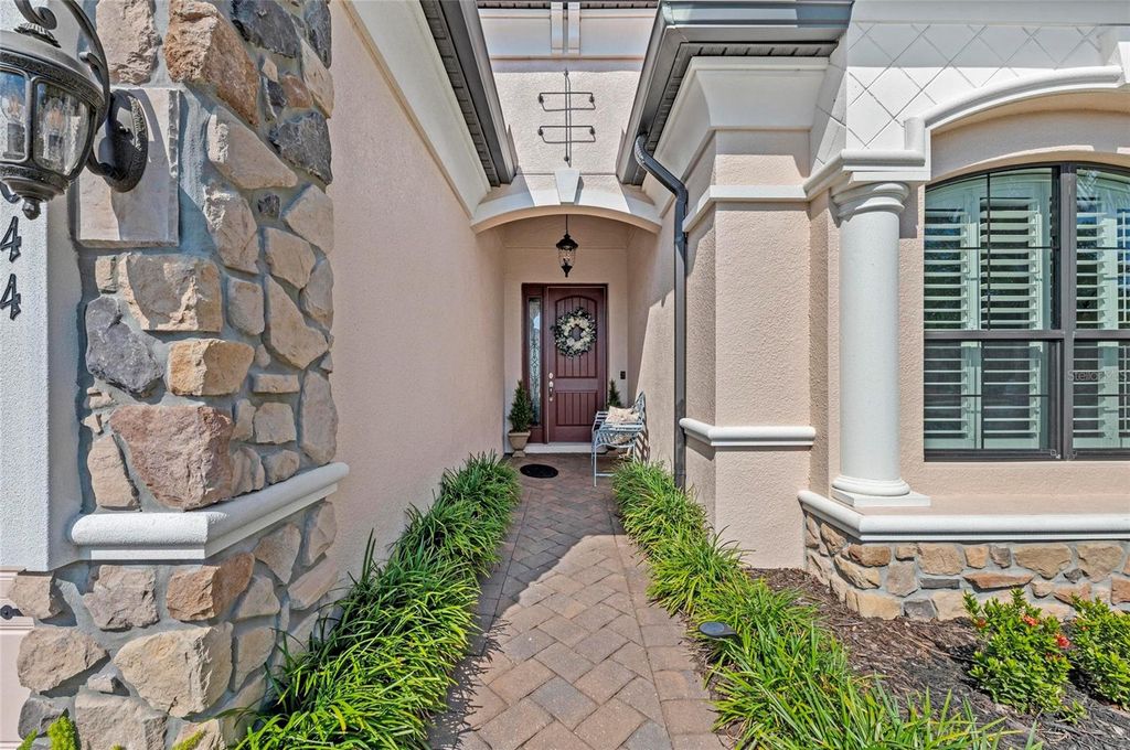 Photo of 7044 Whittlebury Trail, Bradenton, FL 34202 (MLS # A4648866)