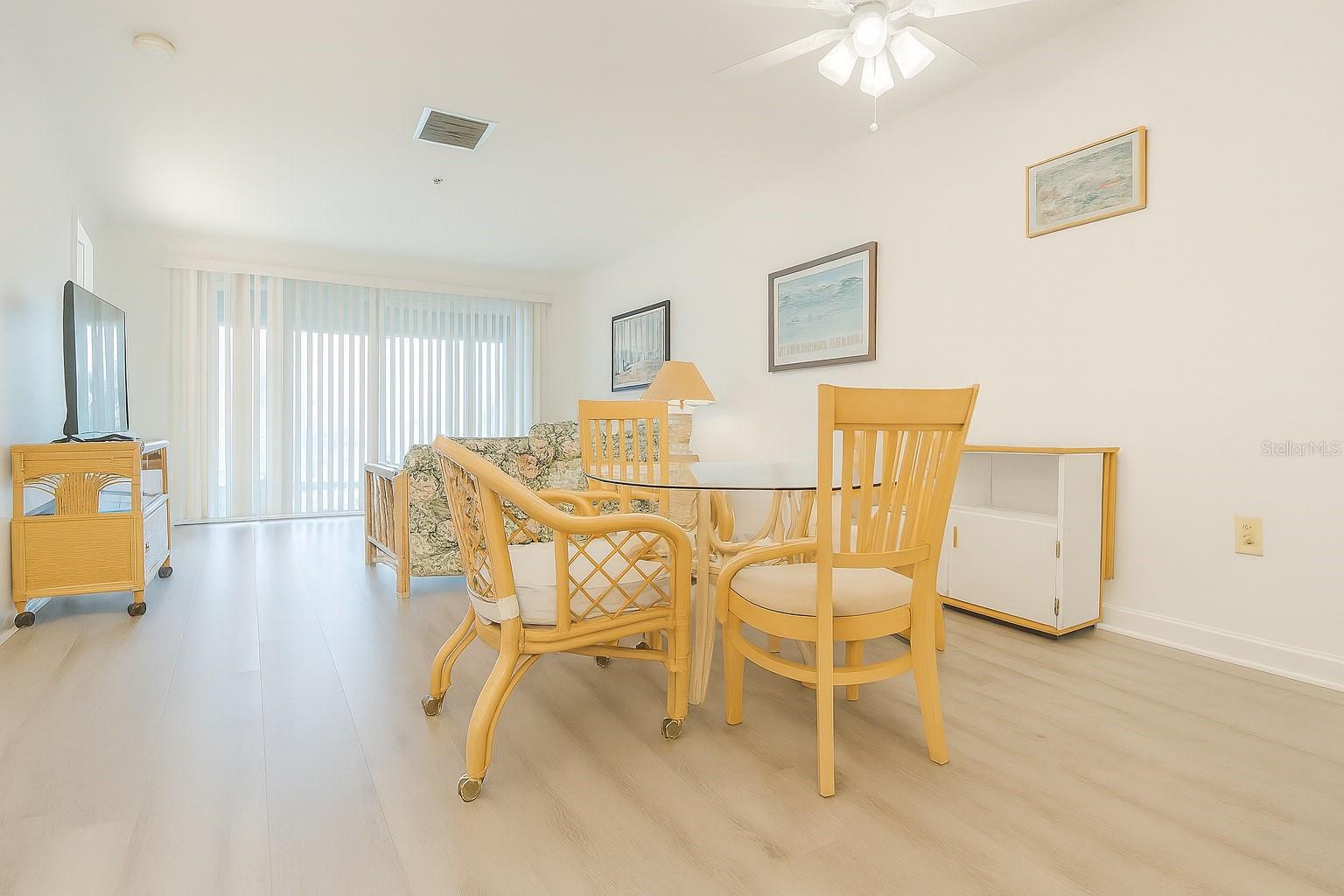 Beautifully 2BR/2BA condo offering a serene canal view from the spacious screened lanai and private patio. The bright open floor plan features modern finishes, updated kitchen and bathrooms, and plenty of natural light throughout. Enjoy covered garage parking and a peaceful community atmosphere. Perfectly located just minutes from Downtown Sarasota, SRQ Airport, St. Armands Circle, Lido Beach, and only a short drive to UTC Mall — close to everything Sarasota has to offer!