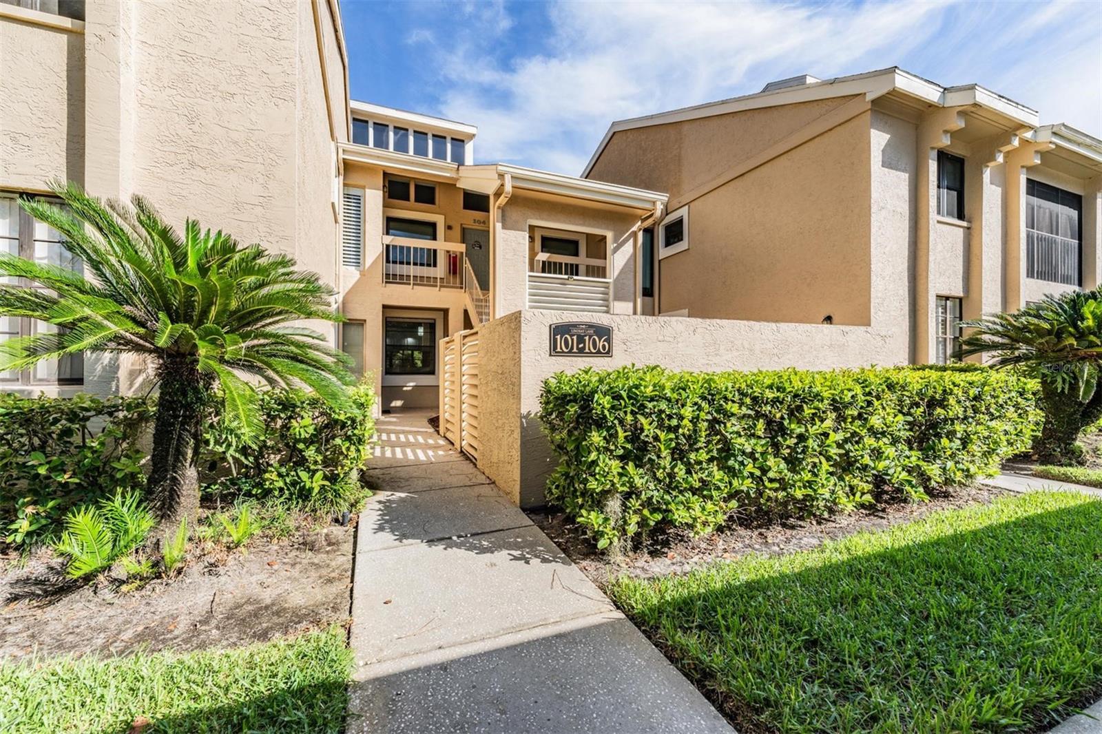 Welcome to this inviting FIRST FLOOR condo in the gated community of East Lake Woodlands. This 2-bedroom, 2-bath home is filled with thoughtful updates and offers a comfortable, easy lifestyle. As you step inside, the kitchen is just to your left, featuring stylish two-toned cabinets with white uppers and blue-gray lowers, along with Stainless Steel appliances that are only three years old. The kitchen opens to the dining and living area, giving the space an open and welcoming feel. A wet bar in the dining room adds a fun touch for entertaining family and friends.
One of the highlights of this condo is the large screened-in back patio, where you can relax and enjoy peaceful views of the conservation area. It’s the perfect spot to watch wildlife and soak in the natural setting. The patio also includes a storage closet with the washer and dryer, making laundry convenient and out of the way.
The primary bedroom is tucked away in the rear of the home, offering privacy and a calming retreat. It has laminate flooring, a slider to the patio, two closets including a walk-in, and an ensuite bathroom with a beautifully updated walk-in shower and new double vanities. The second bedroom is located at the front of the unit with easy access to the updated second bathroom. The HVAC was recently replaced in 2025, giving peace of mind to the new owner.
Living in East Lake Woodlands means you’ll enjoy a friendly, active community with golf courses, pools, tennis courts, a clubhouse, and miles of sidewalks for walking or biking. Plus, the location couldn’t be better—close to shopping, dining, and all the conveniences you need. *Some photos have been virtually staged* This condo is the perfect place to settle in and feel right at home. IT'S NOT JUST A HOME...BUT A LIFESTYLE!