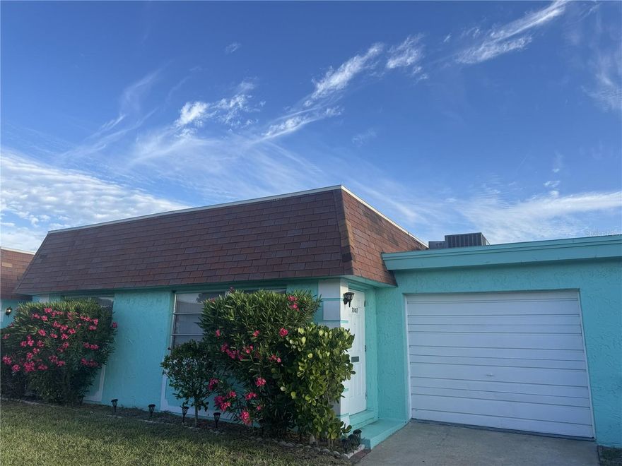 Welcome to easy Florida living in a vibrant and welcoming 55+ community! This beautifully maintained home offers the perfect blend of comfort, space, and convenience—all in a location that truly has it all.

Step inside to discover a thoughtfully designed floorplan with generous room sizes throughout. The primary suite is a relaxing retreat, complete with a walk-in closet and private en-suite bath featuring a walk-in shower. The second bedroom is also large and there is a second full bath with a tub/shower combo which is ideal for guests.

The kitchen includes a spacious eat-in area that can easily flex to fit your lifestyle—whether you envision a cozy breakfast nook, home office, or casual TV space. The open living and dining area is perfect for entertaining or simply enjoying everyday comfort.

Out back, a charming patio provides a peaceful spot to unwind and enjoy cooler evenings. Additional highlights include a private garage—a rare find in Pinellas County—and your own full-size washer and dryer for added convenience.

The community amenities make life here even more enjoyable, with your association covering water, sewer, trash, cable, internet, plus access to a heated pool and clubhouse featuring shuffleboard and bocce ball courts.

When it’s time to explore, you’re surrounded by some of the area’s best destinations.  It is close to parks, shopping, and dining, performing arts center and you’re just a short drive from the stunning Gulf beaches like St. Pete Beach and Clearwater Beach, as well as the energy and culture of Downtown St. Petersburg.  You are also only about 30 minutes from Tampa International Airport.