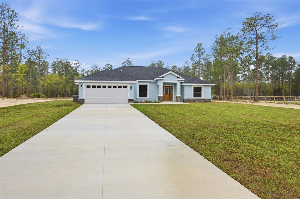 Photo of 13282 SW 71st Lane, Ocala, FL 34481 (MLS # OM721596)