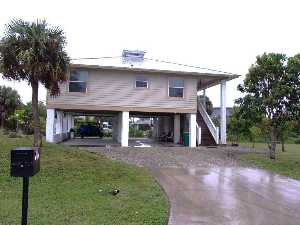 Photo of 24279 Yacht Club Boulevard, Punta Gorda, FL 33955 (MLS # C7509286)