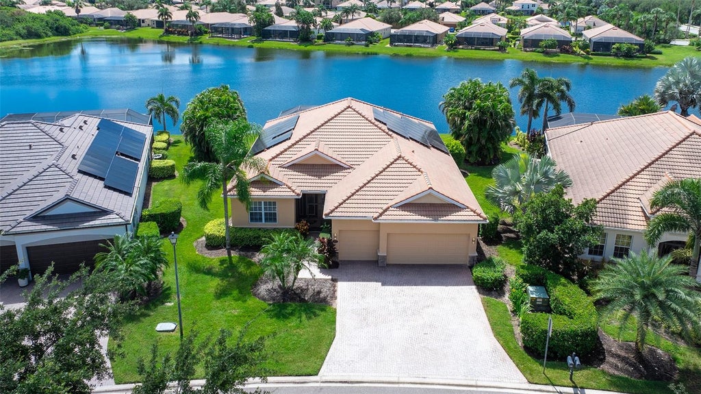 Photo of 415 Grand Preserve Cove, Bradenton, FL 34212 (MLS # A4705677)