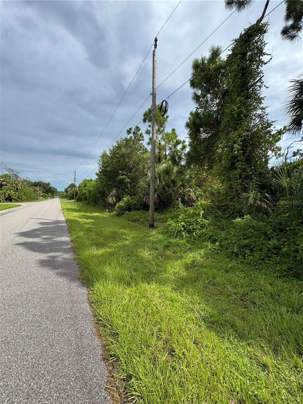 Photo of 395 Ramblewood Street, Port Charlotte, FL 33953 (MLS # N6139841)